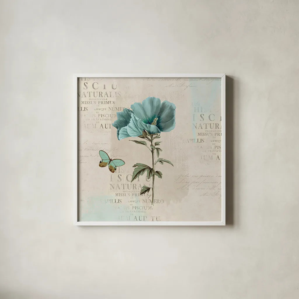 En Bleu V by Katie Pertiet. Shown in a crisp white glass frame for a clean and minimalist style. Available as an archival giclee rolled canvas, fine art paper, or poster print. SKU 21349a.