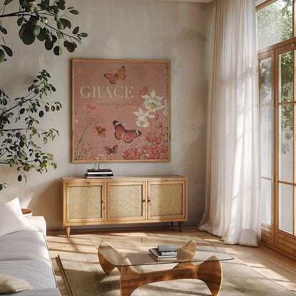 Flutter and Bloom II by Katie Pertiet. Shown in a natural wood frame in a cozy modern living room. Available as an archival giclee rolled canvas, fine art paper, or poster print. SKU 98287a.