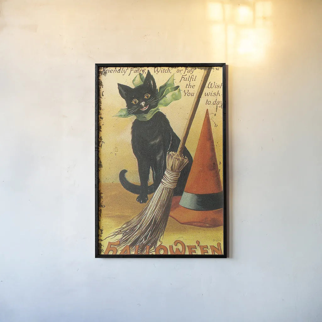 Halloween Nostalgia Cat with Broom by Katie Pertiet. shown as a paper print in a black flame. Available as a archival giclee rolled canvas, fine art paper, or poster print. SKU 57290h.