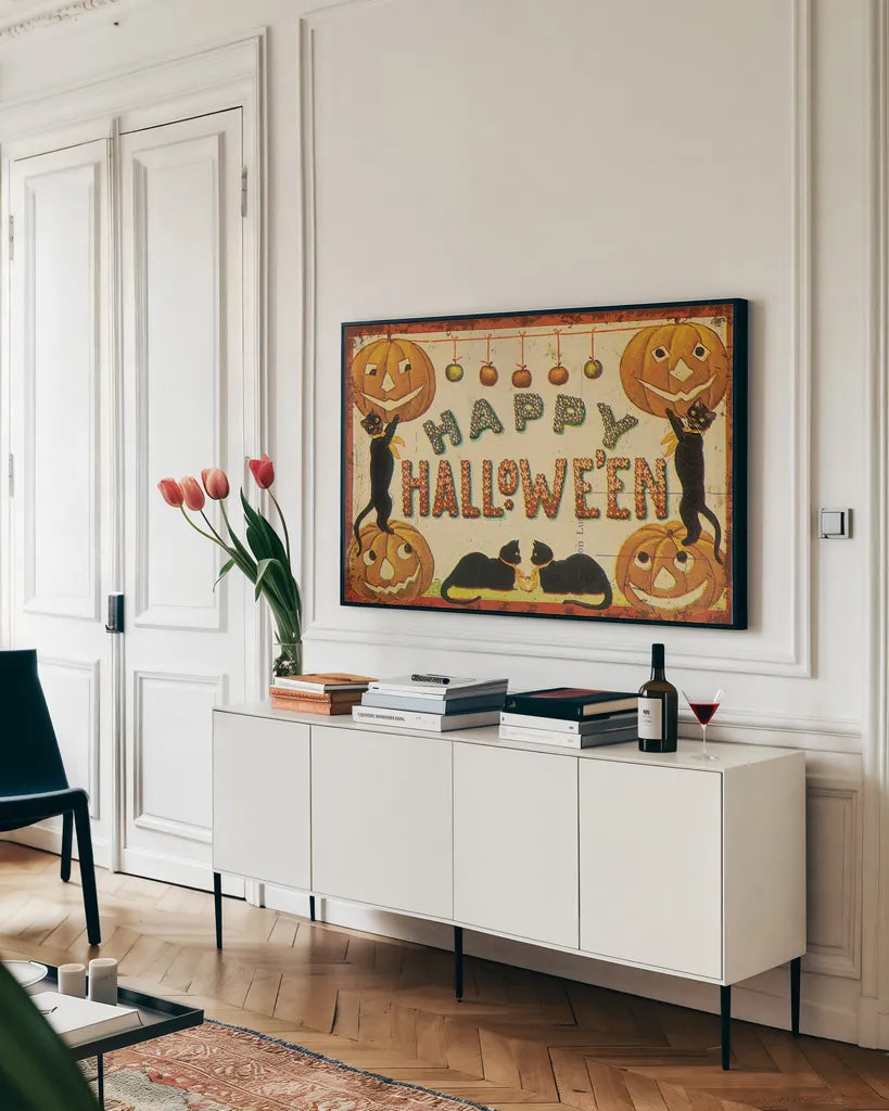 Halloween Nostalgia Happy Halloween by Katie Pertiet. shown as a framed stretched canvas in a living room above a console. Available as a archival giclee rolled canvas, fine art paper, or poster print. SKU 57289i.
