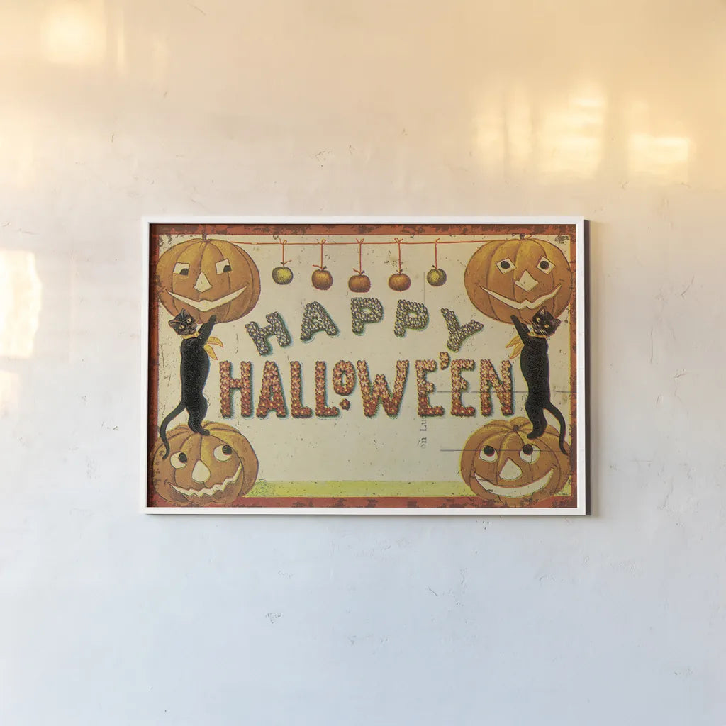 Halloween Nostalgia Happy Halloween v2 by Katie Pertiet. shown as a paper print in a white frame. Available as a archival giclee rolled canvas, fine art paper, or poster print. SKU 61452i.