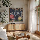 Indigo Garden IV by Katie Pertiet. Shown in a natural wood frame in a cozy modern living room. Available as an archival giclee rolled canvas, fine art paper, or poster print. SKU 94952a.