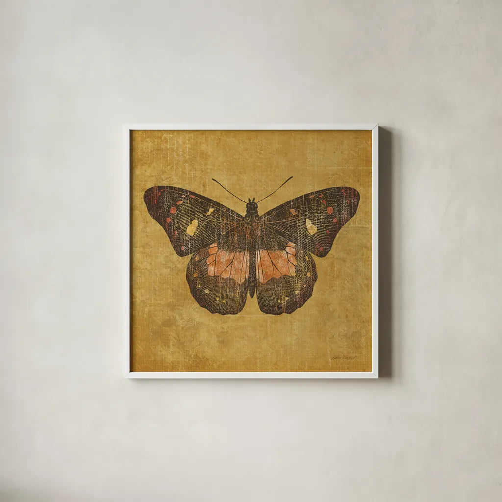 Ochre Butterfly by Katie Pertiet. Shown in a crisp white glass frame for a clean and minimalist style. Available as an archival giclee rolled canvas, fine art paper, or poster print. SKU 5957a.