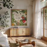 Parrot Paradise V by Katie Pertiet. Shown in a natural wood frame in a cozy modern living room. Available as an archival giclee rolled canvas, fine art paper, or poster print. SKU 42064a.