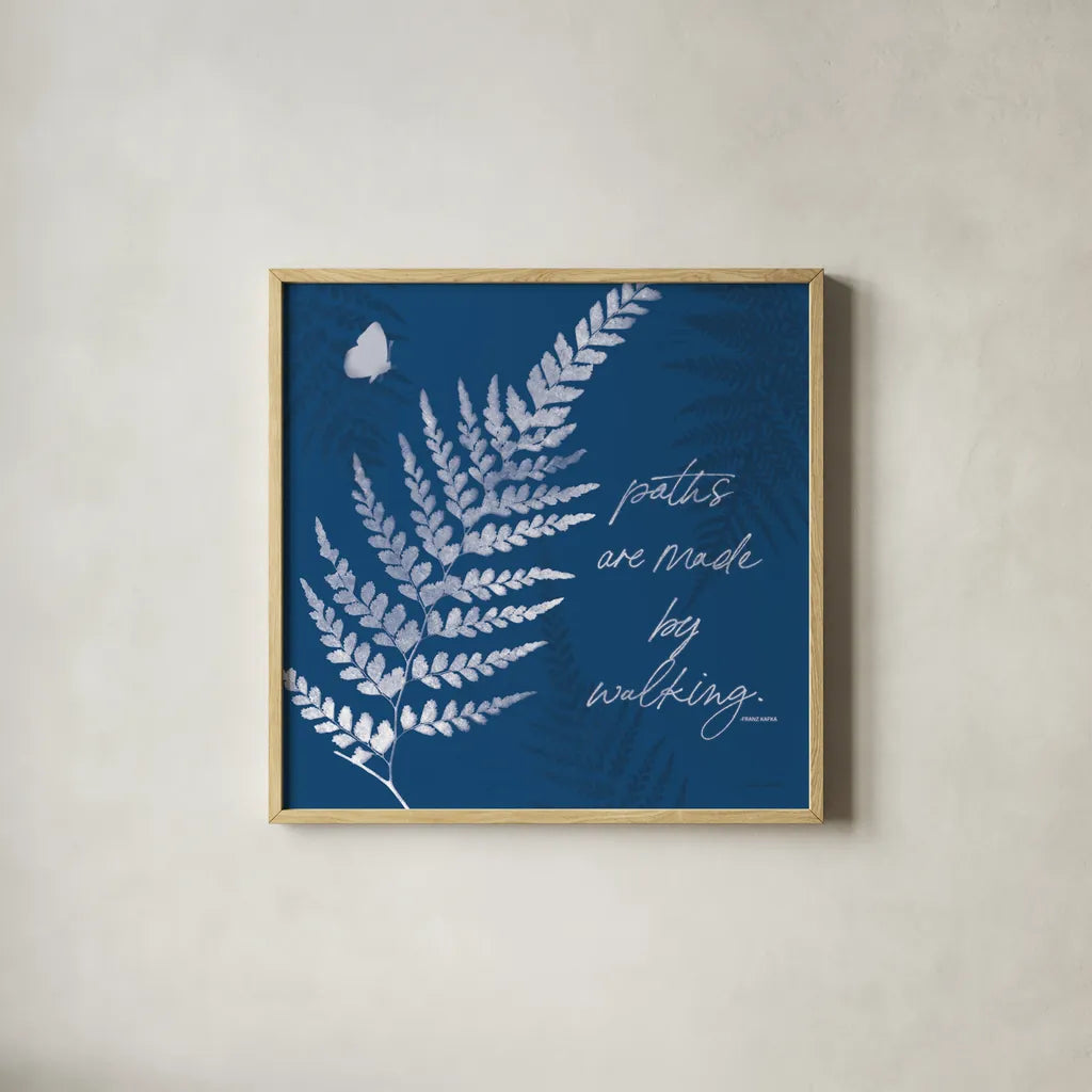 True Blue III by Katie Pertiet. Shown in a natural wood glass frame for a timeless modern aesthetic. Available as an archival giclee rolled canvas, fine art paper, or poster print. SKU 62863a.