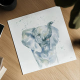 Baby Elephant by Katrina Pete. Shown as a detailed flat fine art print, highlighting archival giclee quality. Available as an archival giclee rolled canvas, fine art paper, or poster print. SKU 66162a.
