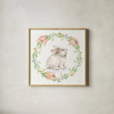 Blooming Bunnies I by Katrina Pete. Shown in a natural wood glass frame for a timeless modern aesthetic. Available as an archival giclee rolled canvas, fine art paper, or poster print. SKU 84605a.