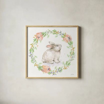 Blooming Bunnies I by Katrina Pete. Shown in a natural wood glass frame for a timeless modern aesthetic. Available as an archival giclee rolled canvas, fine art paper, or poster print. SKU 84605a.