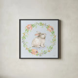 Blooming Bunnies I Blue by Katrina Pete. Shown in a sleek black glass frame for a contemporary gallery look. Available as an archival giclee rolled canvas, fine art paper, or poster print. SKU 89676a.