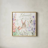 Blooming Bunnies III by Katrina Pete. Shown in a natural wood glass frame for a timeless modern aesthetic. Available as an archival giclee rolled canvas, fine art paper, or poster print. SKU 84607a.