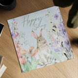 Blooming Bunnies III Hoppy by Katrina Pete. Shown as a detailed flat fine art print, highlighting archival giclee quality. Available as an archival giclee rolled canvas, fine art paper, or poster print. SKU 89677a.