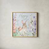 Blooming Bunnies III Hoppy by Katrina Pete. Shown in a natural wood glass frame for a timeless modern aesthetic. Available as an archival giclee rolled canvas, fine art paper, or poster print. SKU 89677a.