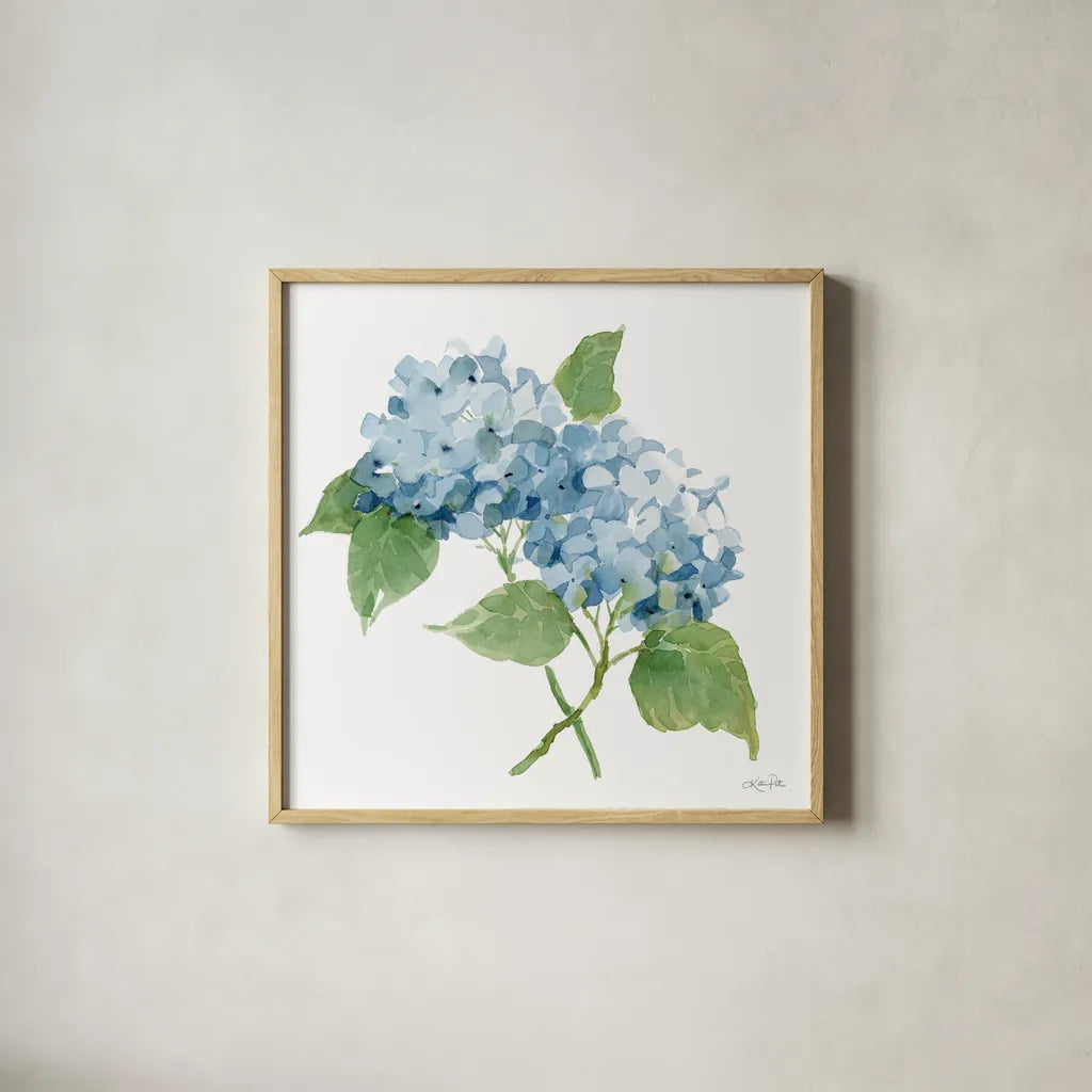 Blue Hydrangea II by Katrina Pete. Shown in a natural wood glass frame for a timeless modern aesthetic. Available as an archival giclee rolled canvas, fine art paper, or poster print. SKU 96896a.
