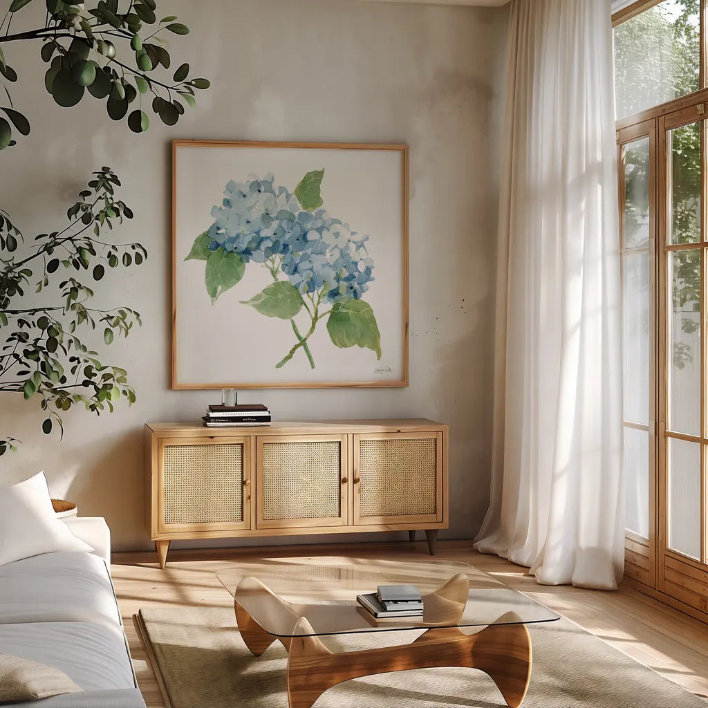 Blue Hydrangea II by Katrina Pete. Shown in a natural wood frame in a cozy modern living room. Available as an archival giclee rolled canvas, fine art paper, or poster print. SKU 96896a.