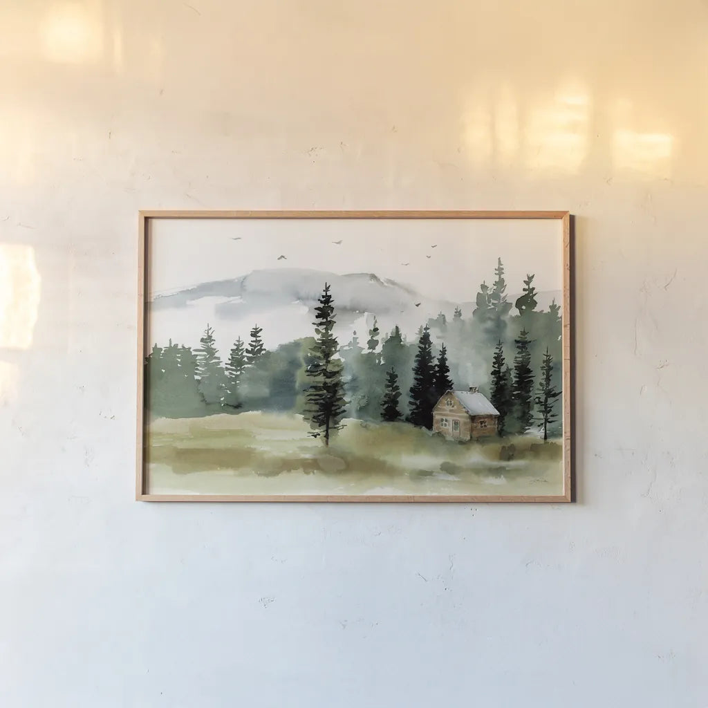 Cabin in the Woods by Katrina Pete. shown as a paper print in a natural frame. Available as a archival giclee rolled canvas, fine art paper, or poster print. SKU 83015i.