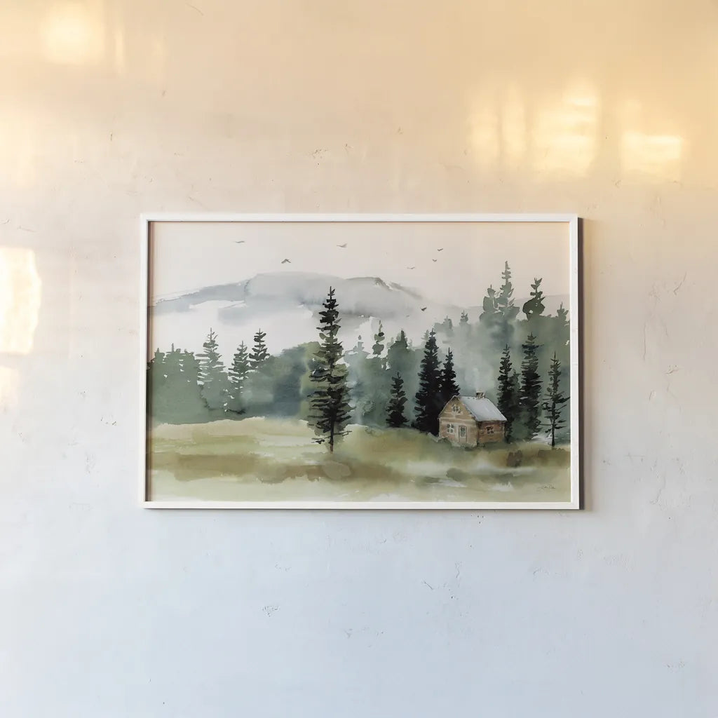 Cabin in the Woods by Katrina Pete. shown as a paper print in a white frame. Available as a archival giclee rolled canvas, fine art paper, or poster print. SKU 83015i.