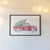 Christmas Truck by Katrina Pete. shown as a paper print in a black flame. Available as a archival giclee rolled canvas, fine art paper, or poster print. SKU 67457i.
