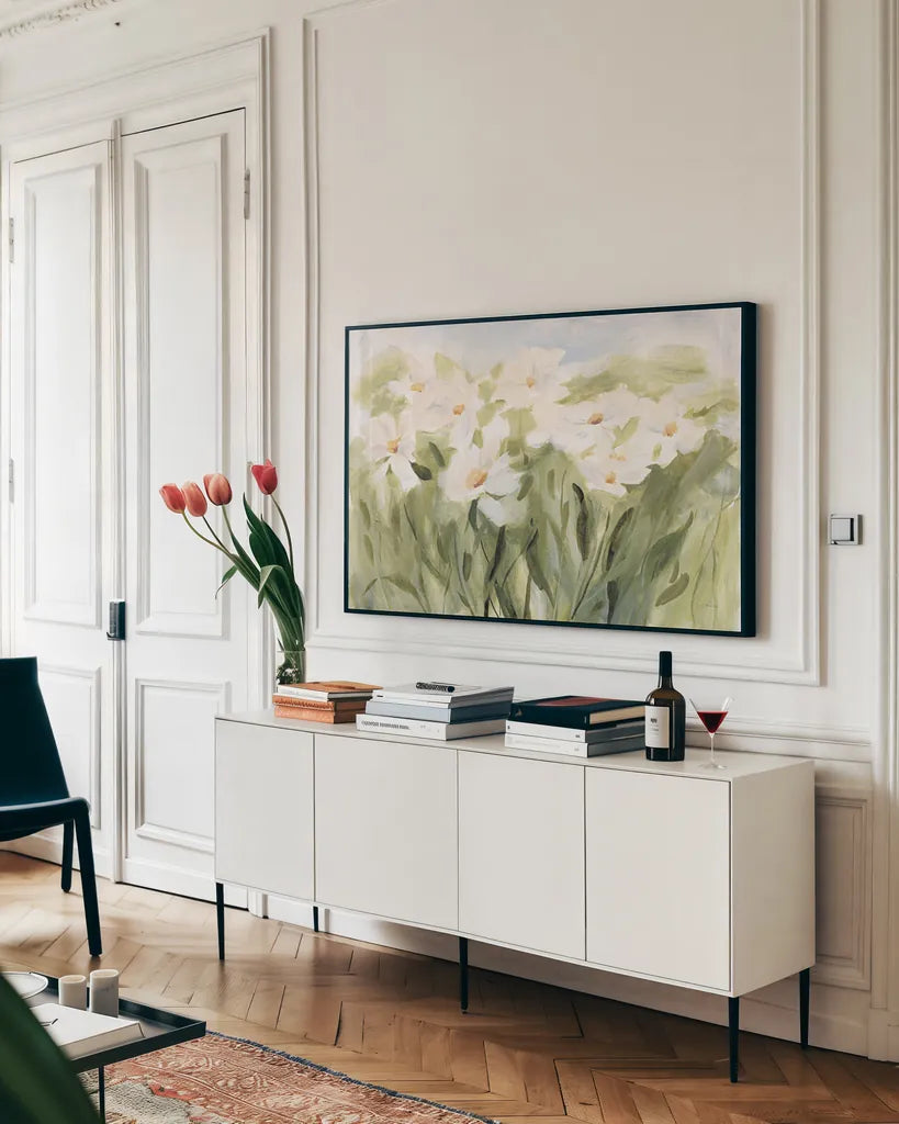 Daisy Meadow by Katrina Pete. shown as a framed stretched canvas in a living room above a console. Available as a archival giclee rolled canvas, fine art paper, or poster print. SKU 87266i.