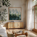 Evening Treeline Sq by Katrina Pete. Shown in a natural wood frame in a cozy modern living room. Available as an archival giclee rolled canvas, fine art paper, or poster print. SKU 69233a.