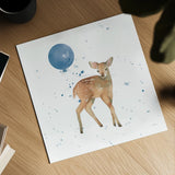 Festive Fawn Blue Sq by Katrina Pete. Shown as a detailed flat fine art print, highlighting archival giclee quality. Available as an archival giclee rolled canvas, fine art paper, or poster print. SKU 68784a.