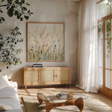 In the Meadow Crop by Katrina Pete. Shown in a natural wood frame in a cozy modern living room. Available as an archival giclee rolled canvas, fine art paper, or poster print. SKU 77834a.