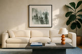 Misty Forest I Green by Katrina Pete. Displayed in a glass frame with matte in a clean modern living room. Available as an archival giclee rolled canvas, fine art paper, or poster print. SKU 75747a.