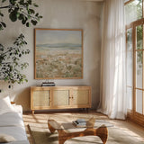 Neutral Meadow by Katrina Pete. Shown in a natural wood frame in a cozy modern living room. Available as an archival giclee rolled canvas, fine art paper, or poster print. SKU 95654a.