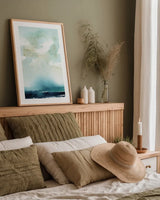 Seascape by Katrina Pete. shown as a paper print in a natural frame. Available as a archival giclee rolled canvas, fine art paper, or poster print. SKU 65951h.