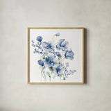 Secret Garden Bouquet II Blue by Katrina Pete. Shown in a natural wood glass frame for a timeless modern aesthetic. Available as an archival giclee rolled canvas, fine art paper, or poster print. SKU 68145a.