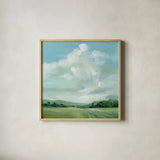 Summer Clouds by Katrina Pete. Shown in a natural wood glass frame for a timeless modern aesthetic. Available as an archival giclee rolled canvas, fine art paper, or poster print. SKU 73252a.