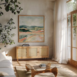 Vermillion Landscape I by Katrina Pete. Shown in a natural wood frame in a cozy modern living room. Available as an archival giclee rolled canvas, fine art paper, or poster print. SKU 65941a.