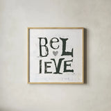 Believe Gray Hearts by Kellie Day. Shown in a natural wood glass frame for a timeless modern aesthetic. Available as an archival giclee rolled canvas, fine art paper, or poster print. SKU 31340a.