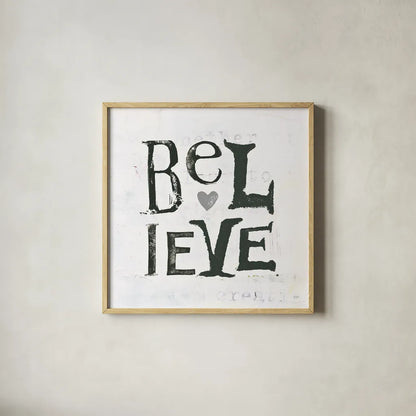 Believe Gray Hearts by Kellie Day. Shown in a natural wood glass frame for a timeless modern aesthetic. Available as an archival giclee rolled canvas, fine art paper, or poster print. SKU 31340a.