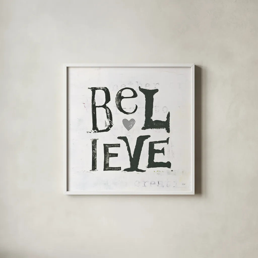 Believe Gray Hearts by Kellie Day. Shown in a crisp white glass frame for a clean and minimalist style. Available as an archival giclee rolled canvas, fine art paper, or poster print. SKU 31340a.