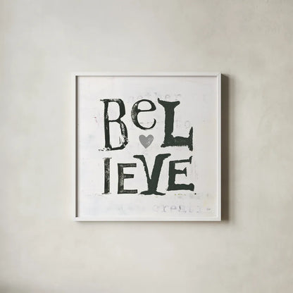 Believe Gray Hearts by Kellie Day. Shown in a crisp white glass frame for a clean and minimalist style. Available as an archival giclee rolled canvas, fine art paper, or poster print. SKU 31340a.