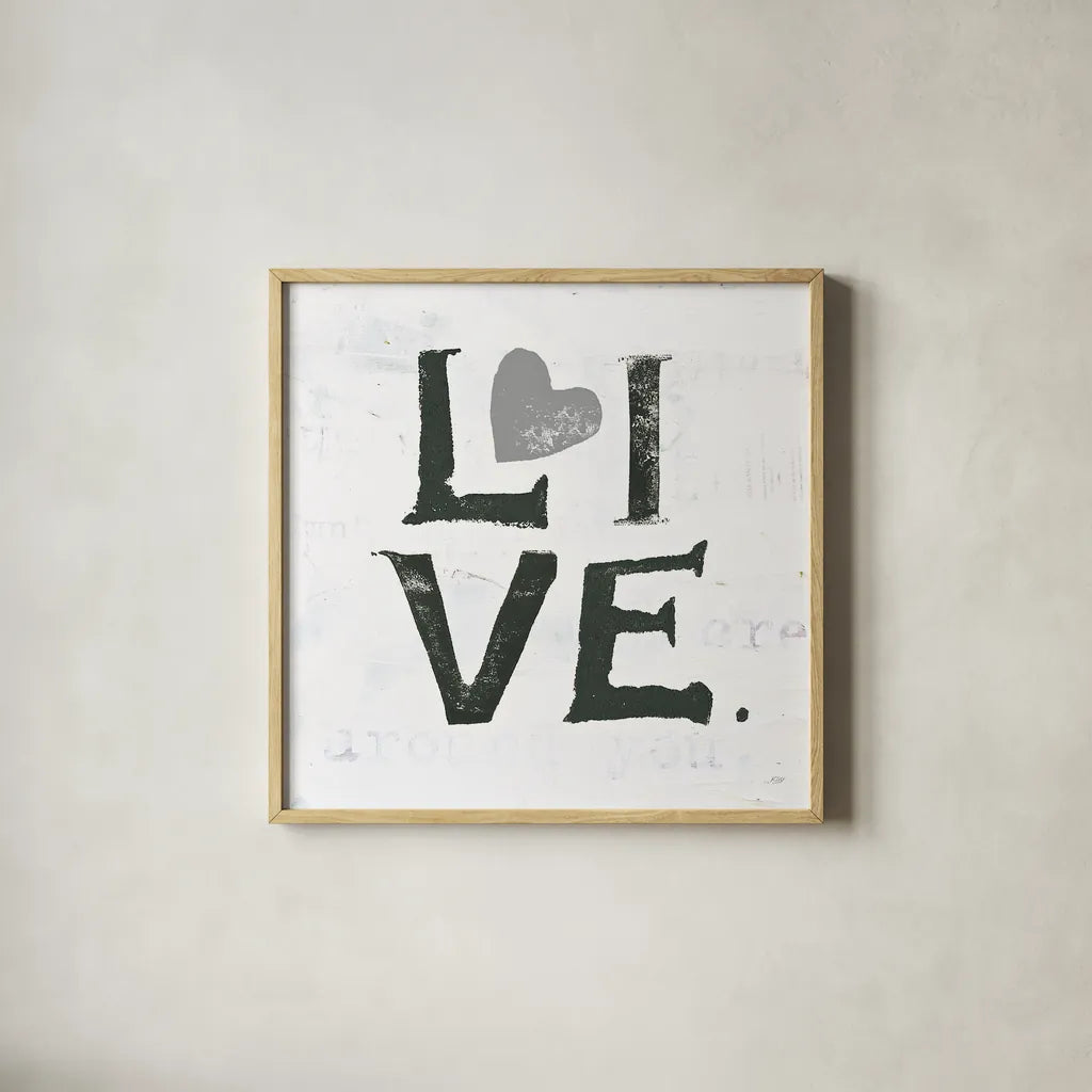 Live Gray Heart by Kellie Day. Shown in a natural wood glass frame for a timeless modern aesthetic. Available as an archival giclee rolled canvas, fine art paper, or poster print. SKU 31341a.