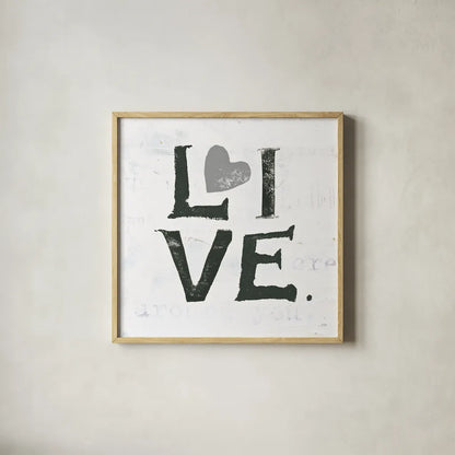 Live Gray Heart by Kellie Day. Shown in a natural wood glass frame for a timeless modern aesthetic. Available as an archival giclee rolled canvas, fine art paper, or poster print. SKU 31341a.