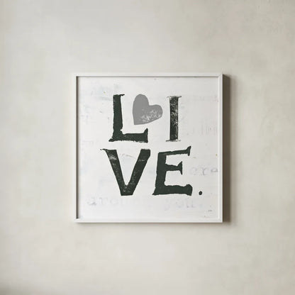 Live Gray Heart by Kellie Day. Shown in a crisp white glass frame for a clean and minimalist style. Available as an archival giclee rolled canvas, fine art paper, or poster print. SKU 31341a.
