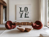 Love Gray Hearts by Kellie Day. Shown as extra-large giant wall art in a modern living room. Available as an archival giclee rolled canvas, fine art paper, or poster print. SKU 31338a.