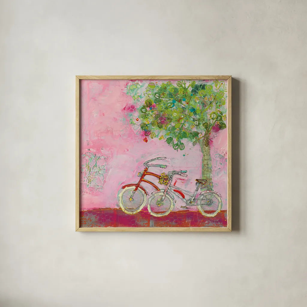Pink Bicycles by Kellie Day. Shown in a natural wood glass frame for a timeless modern aesthetic. Available as an archival giclee rolled canvas, fine art paper, or poster print. SKU 39678a.