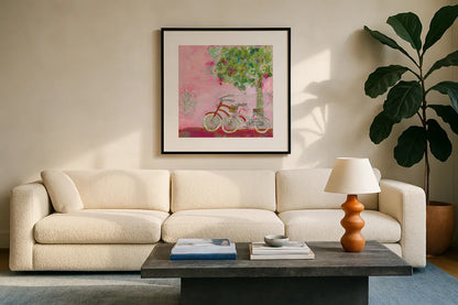 Pink Bicycles by Kellie Day. Displayed in a glass frame with matte in a clean modern living room. Available as an archival giclee rolled canvas, fine art paper, or poster print. SKU 39678a.