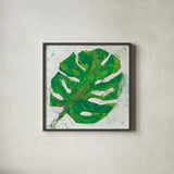 Single Leaf Play on White by Kellie Day. Shown in a sleek black glass frame for a contemporary gallery look. Available as an archival giclee rolled canvas, fine art paper, or poster print. SKU 28279a.