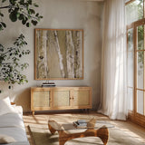 Where the Sun Sleeps I Neutral by Kellie Day. Shown in a natural wood frame in a cozy modern living room. Available as an archival giclee rolled canvas, fine art paper, or poster print. SKU 15104a.