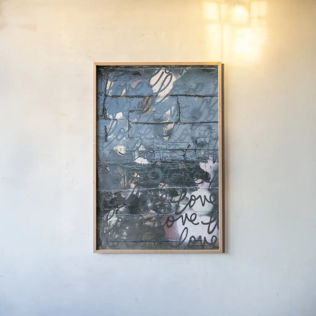 Wall of Love by Kent Youngstrom. shown as a paper print in a natural frame. Available as a archival giclee rolled canvas, fine art paper, or poster print. SKU 80215h.