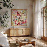 Bright Garden by Kristy Rice. Shown in a natural wood frame in a cozy modern living room. Available as an archival giclee rolled canvas, fine art paper, or poster print. SKU 88611a.
