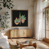 Cactus Party II by Kristy Rice. Shown in a natural wood frame in a cozy modern living room. Available as an archival giclee rolled canvas, fine art paper, or poster print. SKU 98938a.