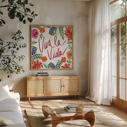 Fridas Flower Fancy II by Kristy Rice. Shown in a natural wood frame in a cozy modern living room. Available as an archival giclee rolled canvas, fine art paper, or poster print. SKU 53335a.