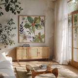 Hellebore Ya Doing IV by Kristy Rice. Shown in a natural wood frame in a cozy modern living room. Available as an archival giclee rolled canvas, fine art paper, or poster print. SKU 44119a.