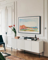 Looking Out by Kristy Rice. shown as a framed stretched canvas in a living room above a console. Available as a archival giclee rolled canvas, fine art paper, or poster print. SKU 59813i.