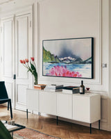 Moody Cove by Kristy Rice. shown as a framed stretched canvas in a living room above a console. Available as a archival giclee rolled canvas, fine art paper, or poster print. SKU 102952i.